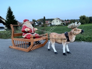 Schönes Rentier mit Schlitten: Rentierschlitten mit Weihnachtsmann und 1 Rentier mit Weihnachtschlitten