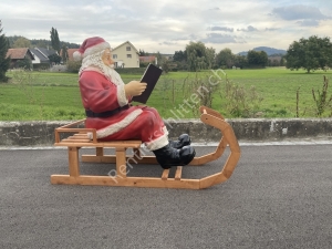 Weihnachtsmann mit Schlitten Weihnachtsmann sitzend, Buch lesend, 130cm lang